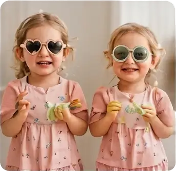 Two girls wearing sunglasses